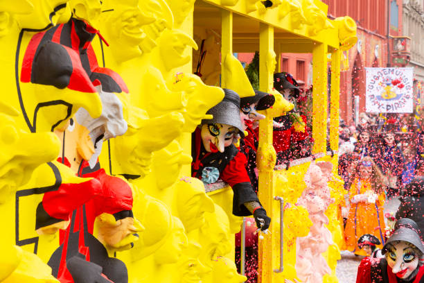 Basel, Switzerland - March 1st 2023. Waggis on a float throwing confetti