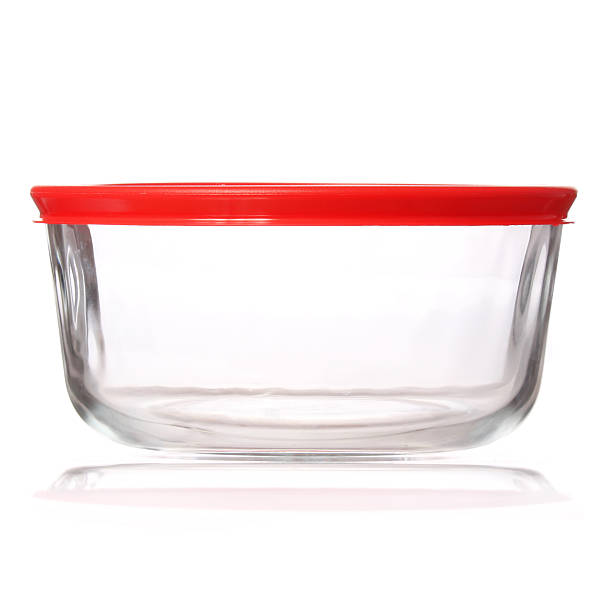 istock Glass food container with red plastic lid isolated 180355153