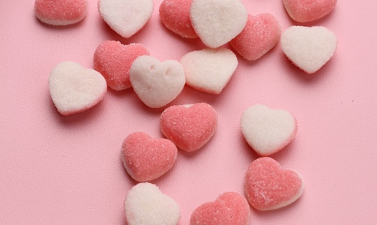Heart-shaped jelly candy with sugar sprinkled on the surface