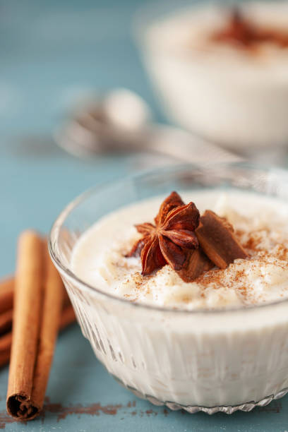 istock Spanish rice pudding Arroz con Leche in glass cream bowl on the table 1803578267