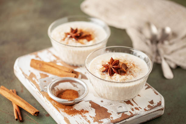istock Spanish rice pudding Arroz con Leche in glass cream bowl on the table 1803578269