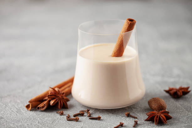 istock Traditional Christmas milk cocktail - Eggnog with cinnamon 1803583115