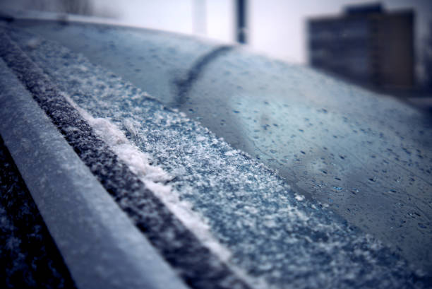 On the windshield of the car, a strip from electric heating has thawed