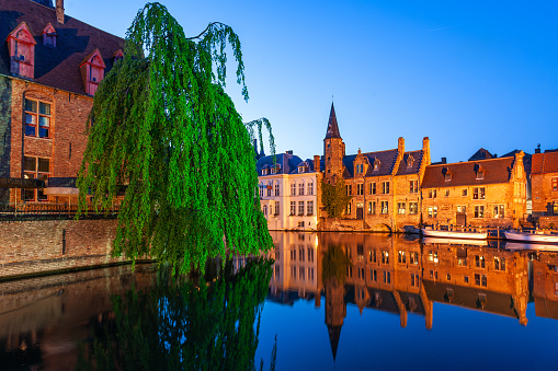 View from the Rozenhoedkaai in Brugge with the Perez de Malvenda house and Belfort van Brugge in the background at night