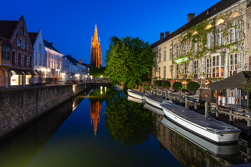 Classic view of channels of Bruges, Belgium. A world heritage city of medieval architecture