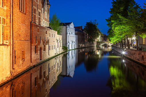 Classic view of channels of Bruges, Belgium. A world heritage city of medieval architecture