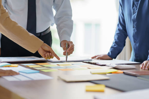 istock Business People brainstorming Meeting Design Ideas use post it notes to share idea professional investor start up project business brainstorming planning in office 1803642998