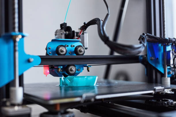 istock 3d printer, machine and plastic in production, design and manufacturing industry. Future, tech and polymer prototype, model and creative innovation, blue and electrical automation process closeup 1803644708