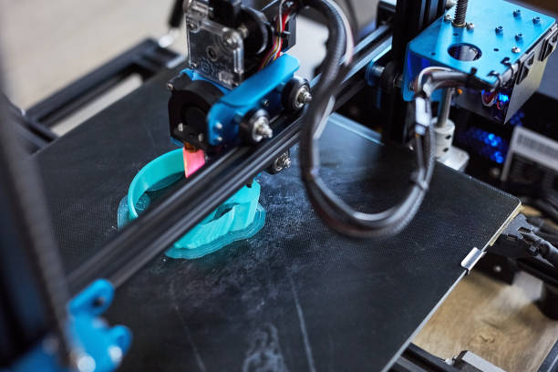 istock 3d printing, machine and plastic model for futuristic technology, innovation or engineering. Digital design, equipment and creative project as prototype in carbon fibre, programming for product idea 1803644716