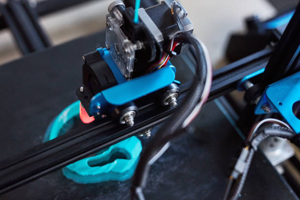istock 3d printer, machine and plastic in manufacturing, top view and production industry. Future tech, closeup and prototype, model and creative innovation, design and electrical automation process above 1803644724
