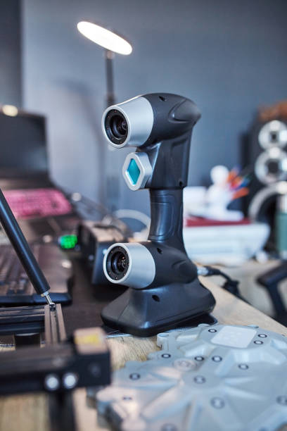 istock 3d printing, portable laser scanner with model on desk for design, high tech or futuristic process tools in workshop. Engineering lab, future technology development or handheld LED machine hardware. 1803645237
