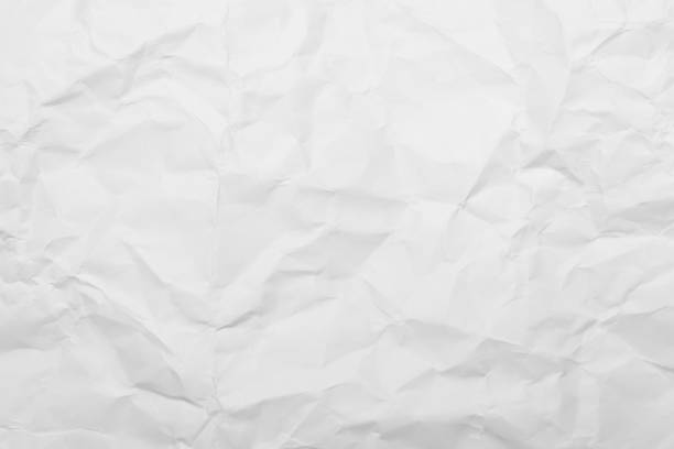istock White Paper Texture background. Crumpled white paper abstract shape background with space paper recycle for text 1803650126