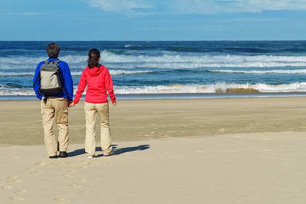 istock Happy couple on beautiful ocean beach 180367233