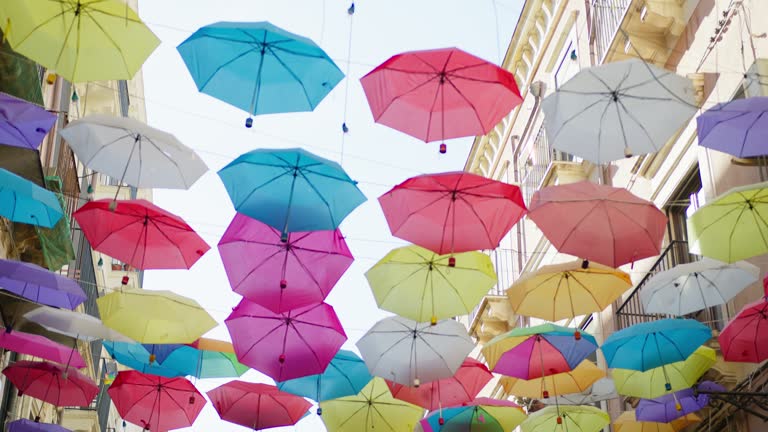 Umbrella composition in a street of Catania