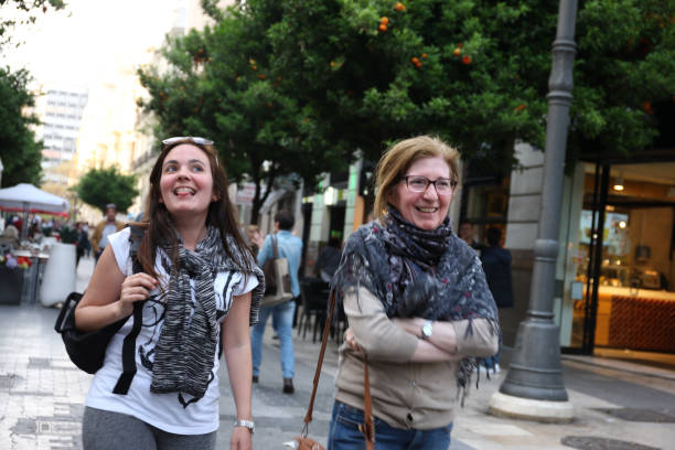 istock Ladies having fun shopping 1803687650