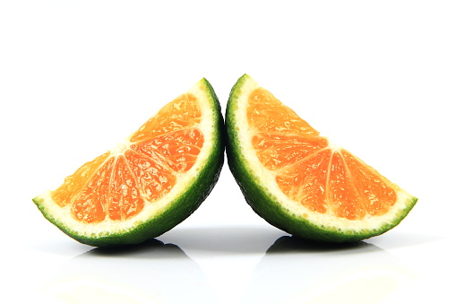 Citrus fruits on white background