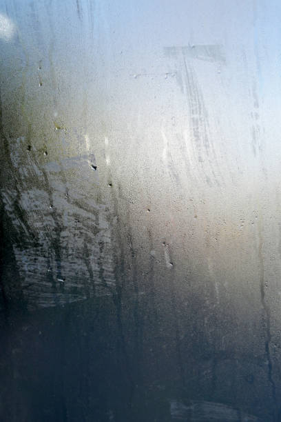 istock Raindrops on an old dirty glass 1803692125