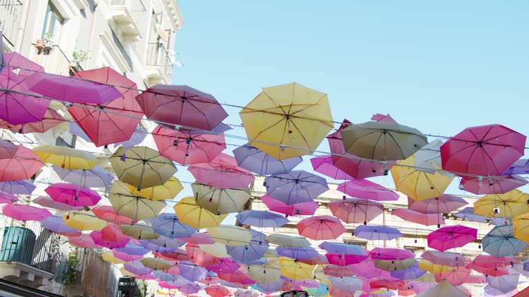 Umbrella composition in a street of Catania