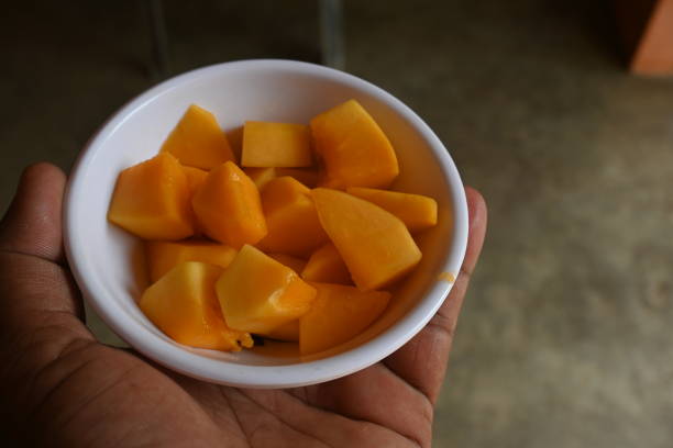 istock Ripe papaya sliced on bowl. 1803694365