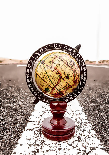 istock Globe Earth on an Asphalt Street 1803711502