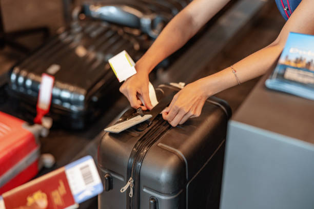 istock Baggage Check-in At The Airport Counter 1803720204