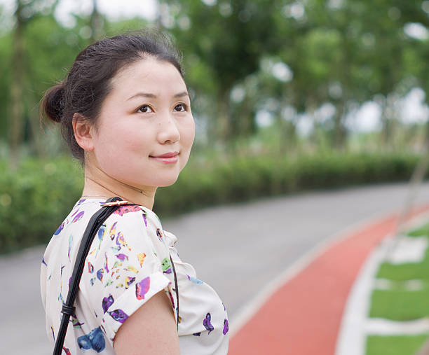 istock Asian women in a park 180374466