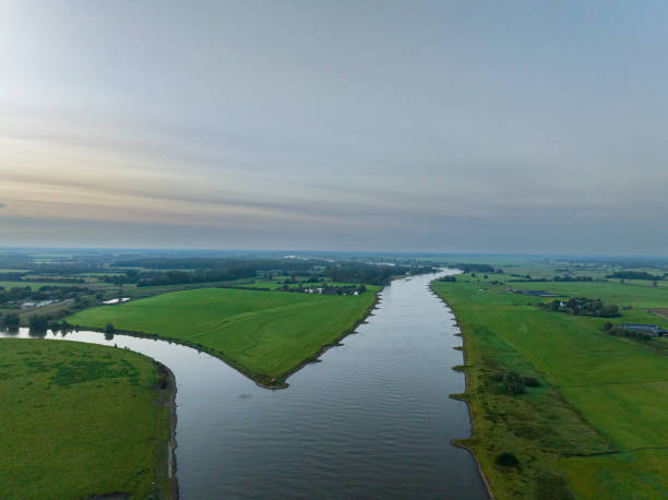 istock IJssel sunrise panoramic landscape view 1803748644