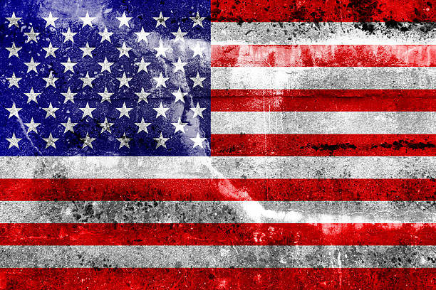istock USA Flag painted on grunge wall 180375161