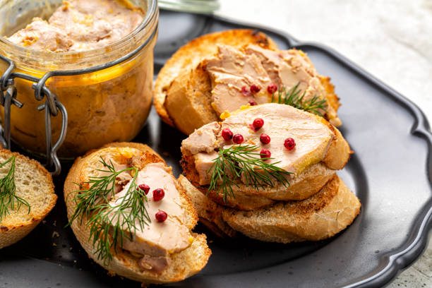 istock Sandwich with liver duck or goose pate. Decorated with red pepper and dill. 1803757659