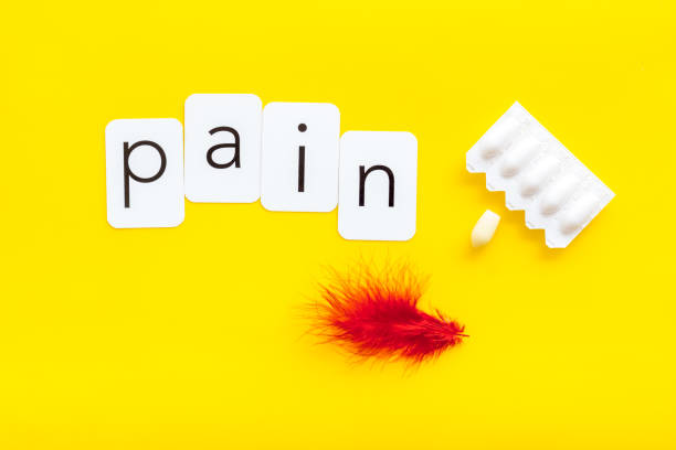 istock Pharmacy concept. Word pain with red pen and rectal suppositories 1803783577