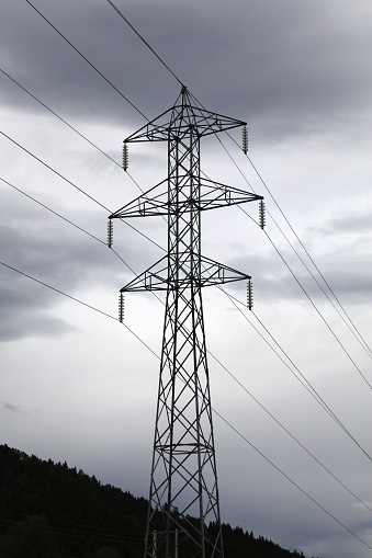 Electric grid in Norway. Steel high tension wire pylon.