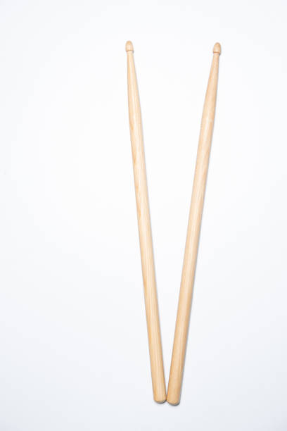 istock Wooden drum sticks on white background. 1803786128