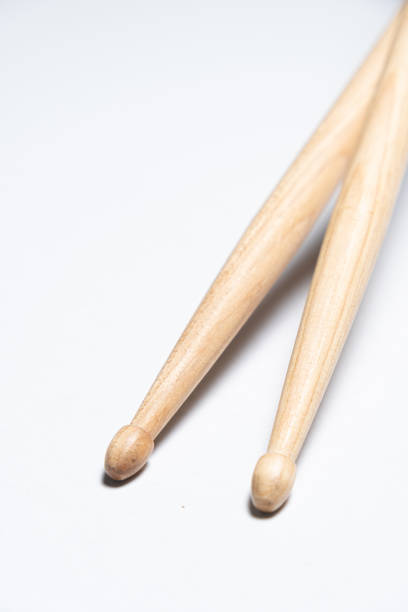 istock Wooden drum sticks on white background. 1803786137