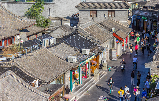 Hutong street with shops anf houses seen from above in Beijing, China