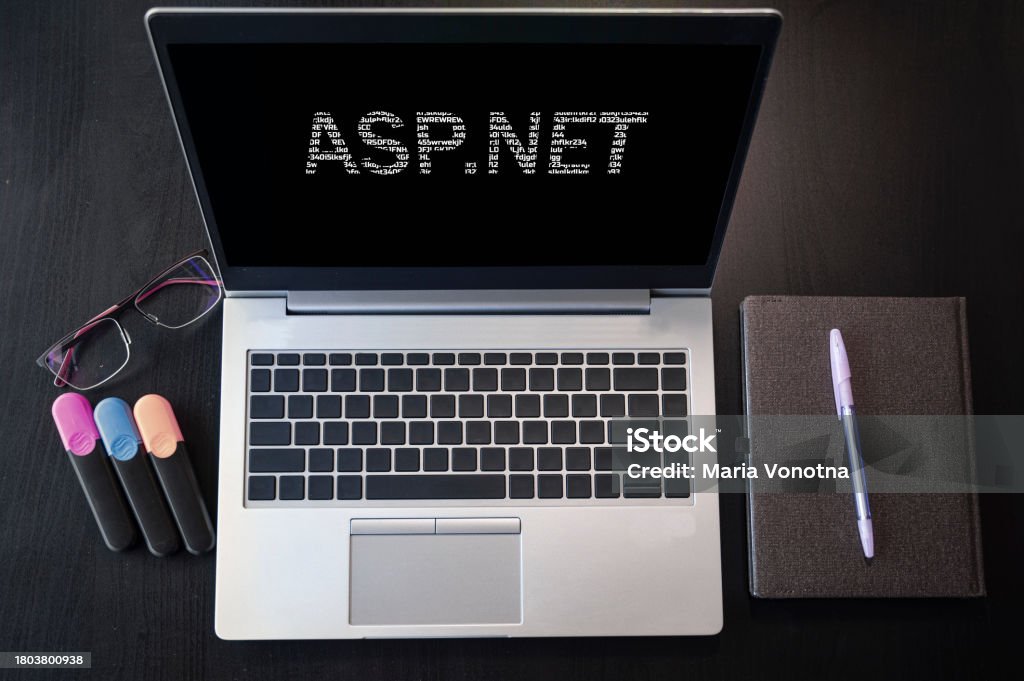 Laptop with ASP.Net text. Top view. ASP.Net inscription on laptop screen. Above Stock Photo