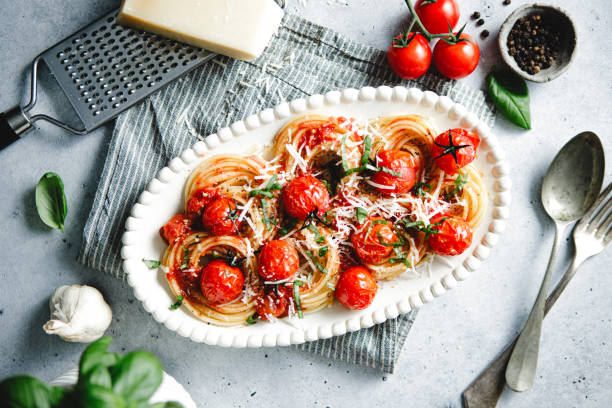 istock Freshly prepared spicy tomato basil pasta served on a plate 1803824162