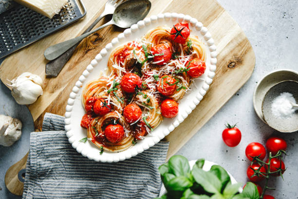 istock Delicious tomato basil pasta served on a plate 1803824182