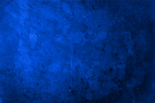 Dark blue coloured blank empty monochrome background with smudges and textured effect all over. There is no people and copy space.