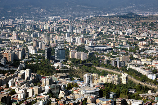 Aerial view of a large modern city with tall buildings. Infrastructure development of modern cities.