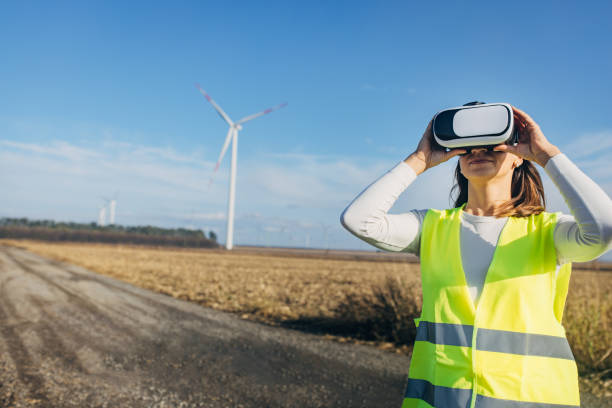 istock Woman using VR glasses to control windmills 1803872273