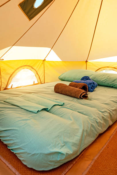 istock Tent with an inflatable mattress inside. Place for two. 1803873337