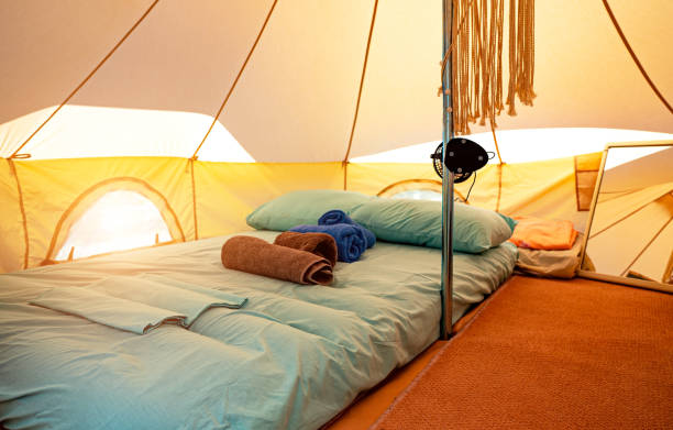 istock Tent with an inflatable mattress inside. Place for two. 1803873340