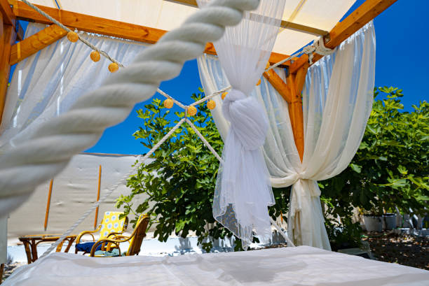 istock Place to relax in the backyard. Hanging canopy bed. 1803873346