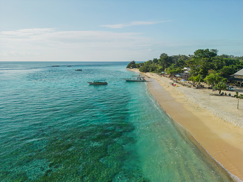 Aerial view of tour boat on idyllic Gili Meno island