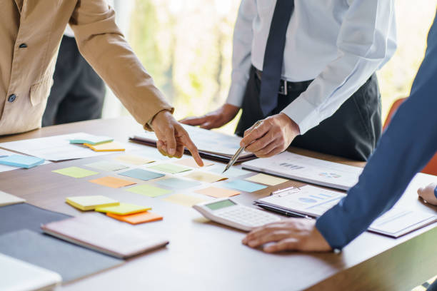 istock Business People brainstorming Meeting Design Ideas use post it notes to share idea professional investor start up project business brainstorming planning in office 1803913635