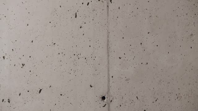 Concrete texture filmed in a minimalist interior, grey Texture, background