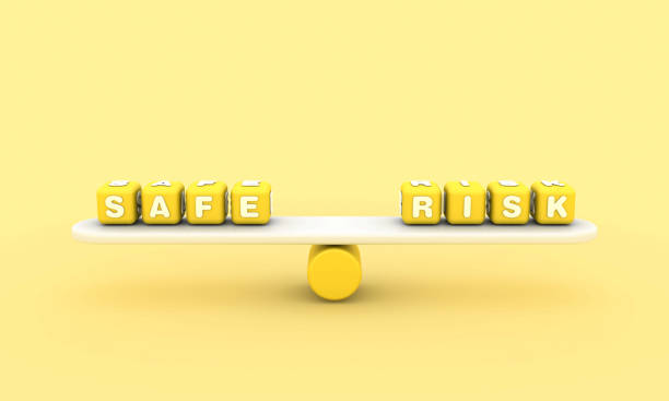istock Seesaw with SAFE RISK Buzzword Cubes 1803944038