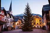 Christmas tree with garlands on marketplace of Hallstatt