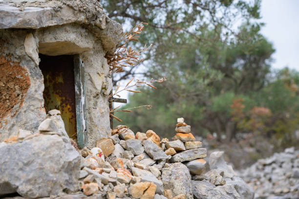 istock Small white chapel on a stone wall near Cres 1803957528