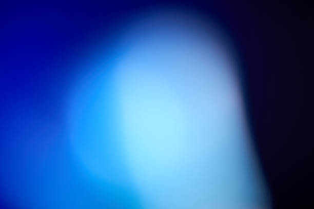 istock Abstract defocused lens blue light leak on black background 1803959719